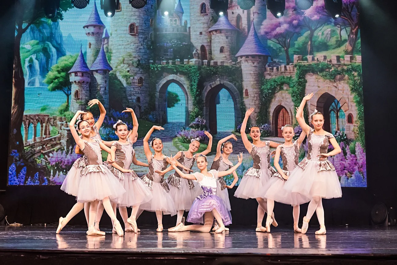 Nika dancers in a castle stage set performance
